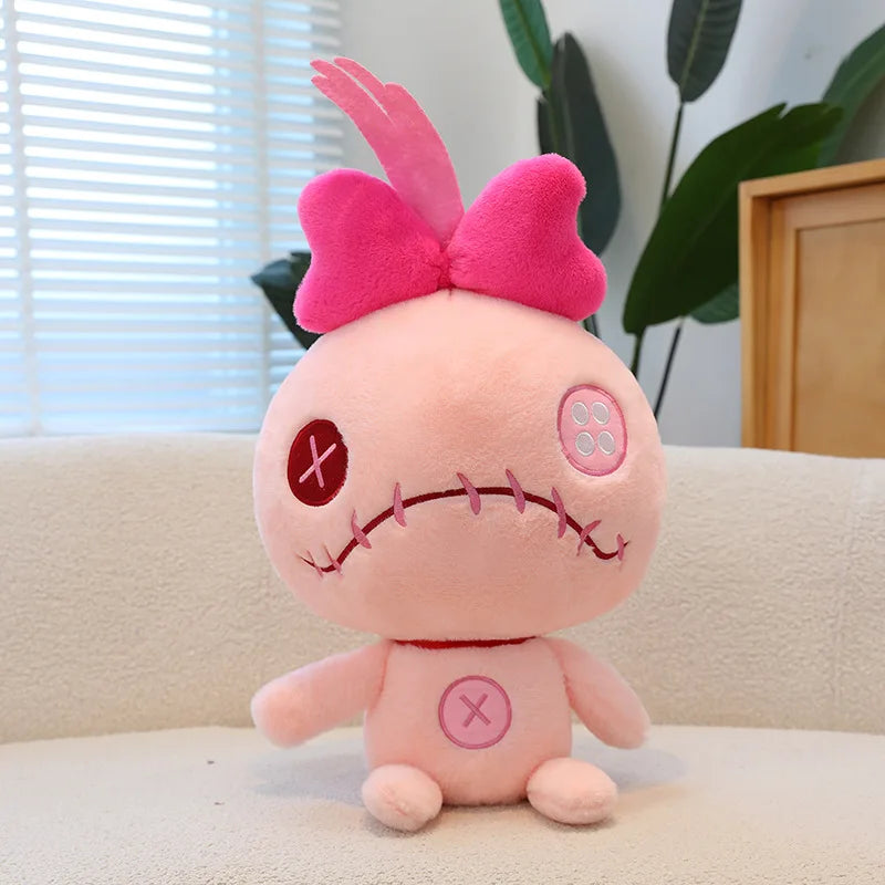 Peluche Scrump verde y rosa