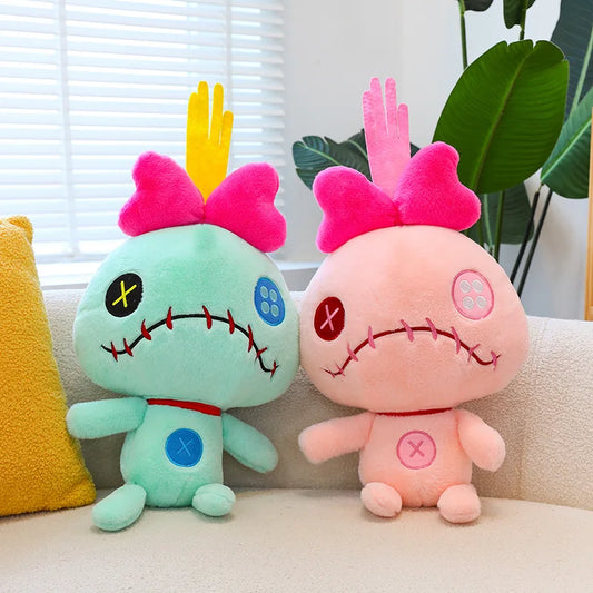 Peluche Scrump verde y rosa