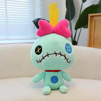 Peluche Scrump verde y rosa