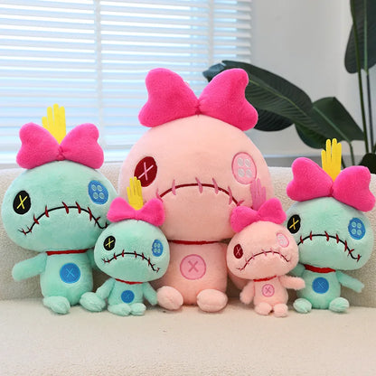 Peluche Scrump verde y rosa
