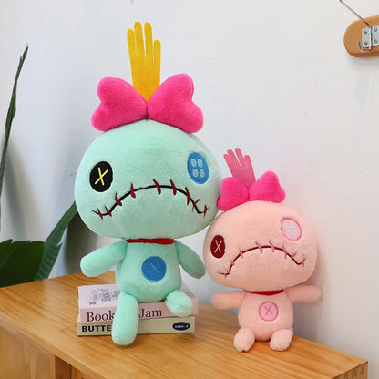 Peluche Scrump verde y rosa
